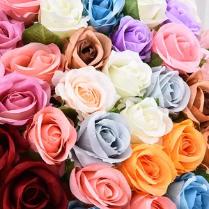 Close-up of colorful artificial velvet roses showing realistic soft petal textures