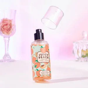 Detalle de bruma corporal sin alcohol Juicy Peach con tapón flotante y diseño de melocotón