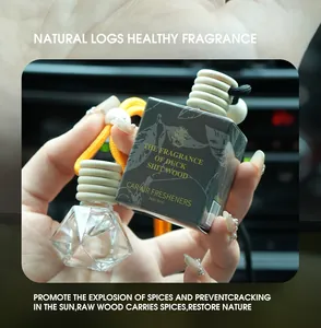 Detailed view of luxury diamond glass car air freshener bottle with elegant packaging