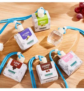 Variety of elegant hanging car air freshener bottles with light blue cords on wood