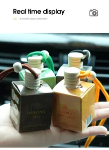 Various scents of car air freshener hanging glass bottles with wooden caps and ropes