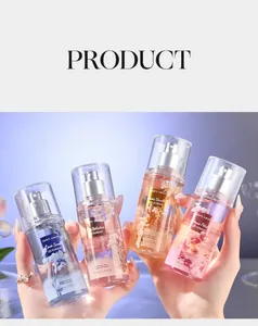 Close-up detail of four long-lasting fragrance mist spray bottles with floral designs