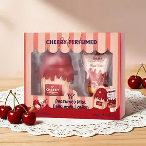 Coffret cadeau brume parfumée cerise et crème mains dans un emballage boîte cupcake