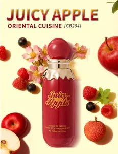 Vibrant red bottle of Juicy Apple hair and body fragrance mist surrounded by fresh fruits.