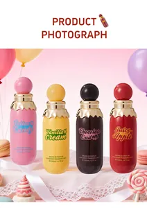 A collection of four gourmet hair and body fragrance mists shown in colorful bottles