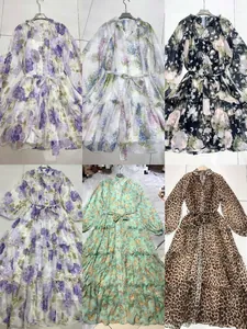 Collage of elegant V-neck dresses with floral and leopard prints, featuring belted waists