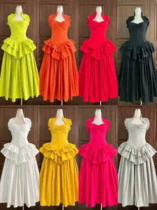 Assorted colors of elegant halter neck dresses with ruffled peplum waist and pleated maxi skirts