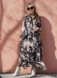 Elegant floral V-neck long sleeve maxi dress with tiered skirt and belted waist.