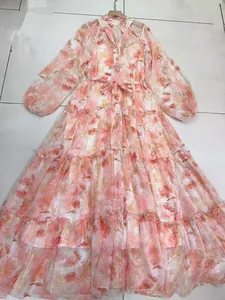 Elegant pink floral chiffon maxi dress with lantern sleeves and tiered skirt details