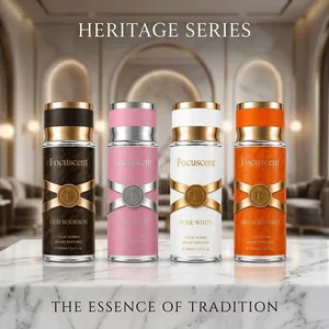 Présentation de flacons de parfum Heritage Series en quatre senteurs sur fond marbre