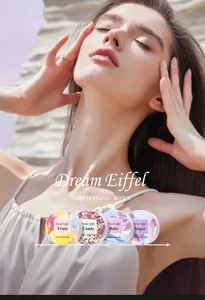 Woman using Dream Eiffel solid perfume balm series including Fruit and Candy scents