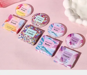 Detailed view of Dream Eiffel solid perfume balm collection in various scents and boxes