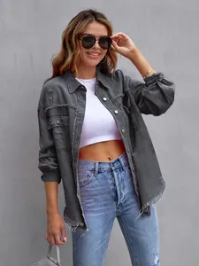 Detailed view of a stylish distressed oversized charcoal gray denim jacket for women