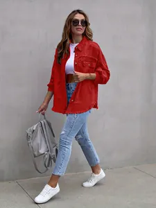 Full-body view of red distressed denim shirt jacket with frayed hem and pockets