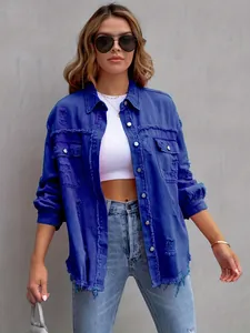 Women's oversized distressed denim jacket in blue with ripped details and long sleeves.