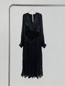 Elegant black V-neck long-sleeve pleated tulle maxi dress with waist detail