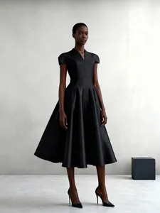 Elegant black V-neck midi dress with structured petal sleeves and flared skirt