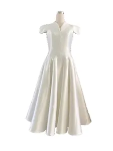 Elegant white V-neck acetate midi puff dress with petal sleeves for formal occasion