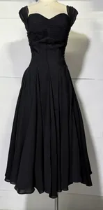 Sophisticated black sleeveless midi dress featuring a pleated bodice and flared skirt