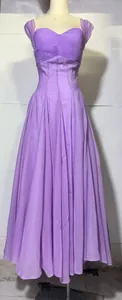 Elegant lavender purple pleated sweetheart neck dress with a flowing maxi skirt detail