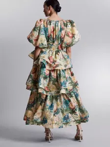 Back view detail of elegant floral layered puff sleeve dress with high waist design