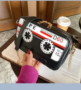 Creative retro audio cassette tape shaped crossbody bag with gold chain strap detail