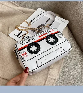 Retro cassette tape shaped crossbody bag with gold chain strap for women in white PU