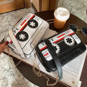 Creative retro cassette tape shaped PU leather crossbody bags with golden chain straps.