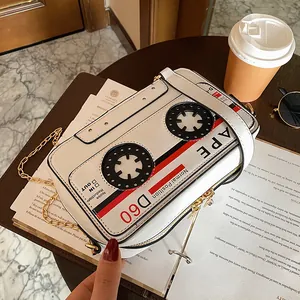Retro cassette tape shaped white PU leather crossbody bag with elegant gold chain strap