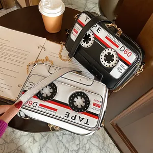 Retro cassette tape shaped PU crossbody bags in black and white with gold chain straps