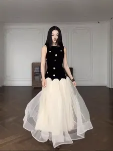 Hepburn style sleeveless long gown featuring 3D floral velvet bodice and white tulle skirt