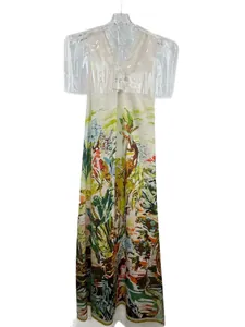 Elegante vestido largo de lino sin mangas con estampado artístico de selva colorida