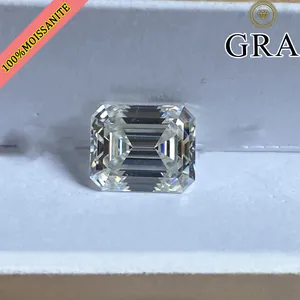 Detail view of emerald cut D color VVS1 moissanite gemstone in white jewelry box
