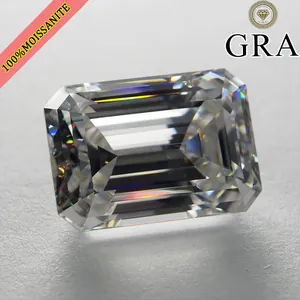 Macro view of emerald-cut D color VVS1 moissanite loose stone with intense rainbow fire