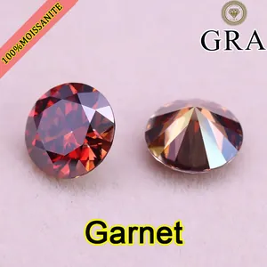 Detailed view of two 5ct garnet red moissanite loose stones with high brilliance