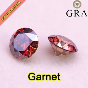Close-up of 5ct garnet red round brilliant moissanite stone with GRA certificate