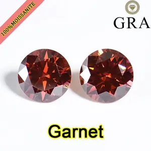 Detail of two 5ct garnet red moissanite stones with GRA logo on white background