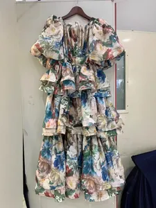 Elegant vintage floral puff sleeve layered maxi dress with high waist and tier ruffles