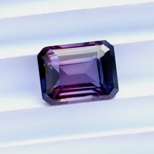 Detailed macro view of an emerald cut natural purple sapphire for jewelry setting