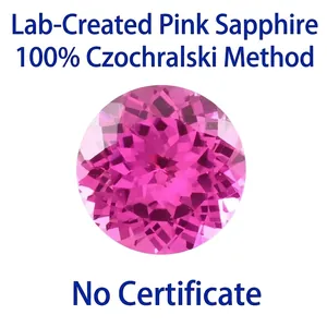 Macro detail of a vivid pink lab-grown sapphire gemstone with round brilliant cut facets
