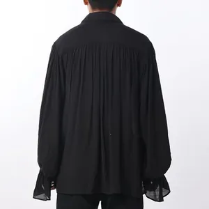 Back view of black medieval men's shirt with pleated back and ruffled sleeve cuffs