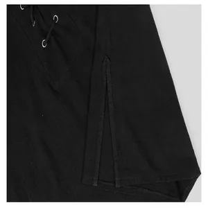 Close-up of medieval men's black vest featuring lace-up cords and side slit detail.