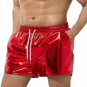 Men's shiny metallic red leather-look shorts with drawstring for beach or club wear.