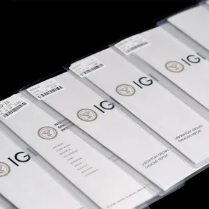 Professional detailed view of multiple IGI laboratory grown diamond grading reports