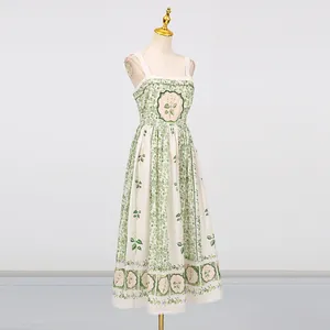 Elegant Mori-style floral print midi dress with slim-fit waist on mannequin display