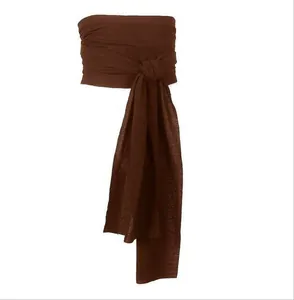 Detail view of a dark brown linen pirate sash belt with a knotted front for costumes.