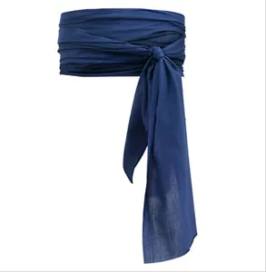 Detail view of a navy blue linen pirate sash tied in a knot for Halloween costumes.