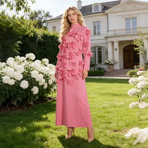Elegant pink French style maxi dress with 3D flower appliques in garden setting