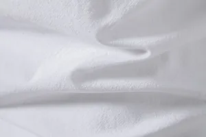 Macro detail of white breathable cotton linen fabric texture for men's casual shirt.