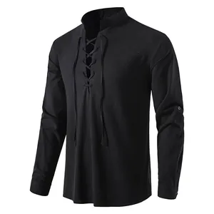 Close-up of men's black cotton-linen Henley shirt with lace-up collar and stand-up neck
